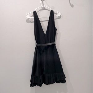 Bebe cocktail dress with ruffles. Size 4.